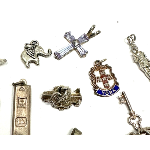 160 - 12 vintage silver charms weight 31g
