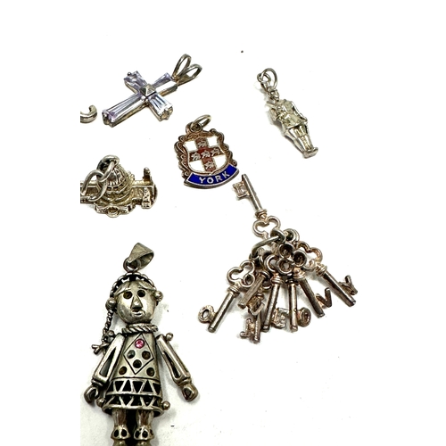160 - 12 vintage silver charms weight 31g