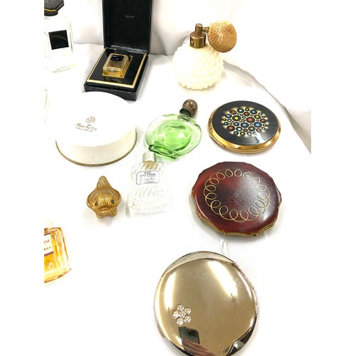 Selection of vintage and later scent bottles and compacts