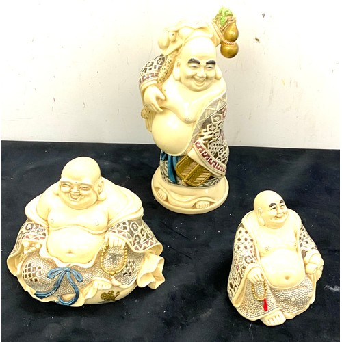 462 - 3 Resin Budda's markings to base, tallest measures 8 inches