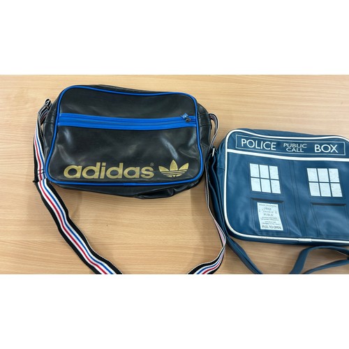 303A - Black and blue Adidas original airliner bag and a retro tardis messenger bag