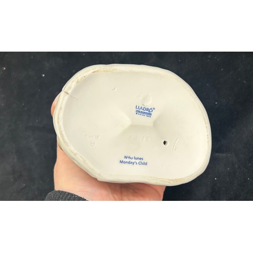 469 - Vintage Lladro Mondays child 6011 figurine and a Lladro porcelain figure of a boy sitting on a tree ... 