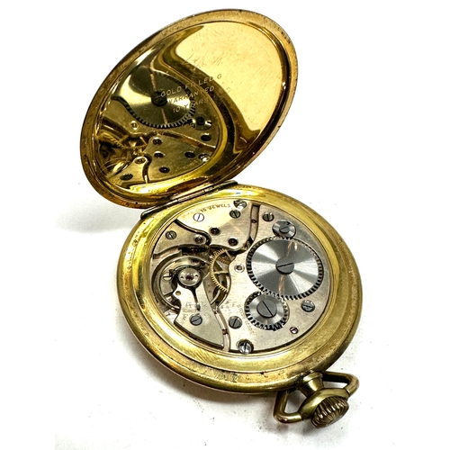396 - Antique art deco gold plated slimline open face pocket watch  the watch is ticking