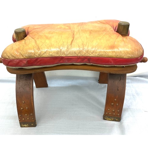 391 - Vintage leather camel stool, approximate measurements: 27 x 14 x 17 inches