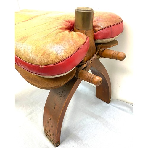 391 - Vintage leather camel stool, approximate measurements: 27 x 14 x 17 inches