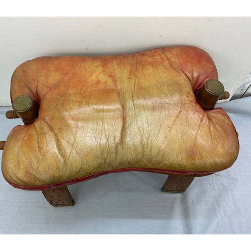 391 - Vintage leather camel stool, approximate measurements: 27 x 14 x 17 inches