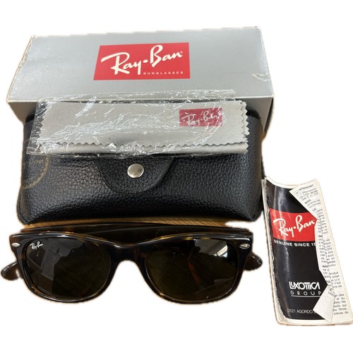 534 - Pair cased Ray-Ban sunglasses