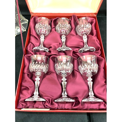 A set of six boxed Cristallerie Zwiesel crystal glass small wine glasses, glass decanters, paperweig