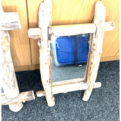 37 - Two driftwood mirrors largest measures approximately 24 inches tall 22 inches wide