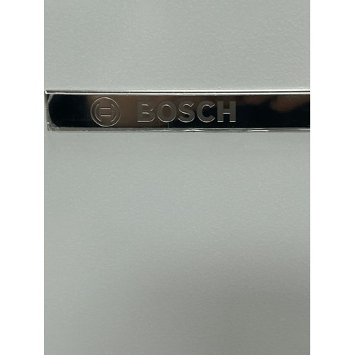 390 - Bosch electronic tall fridge measures approximately: 63 inches tall x 23.5 wide and 27 deep with han... 