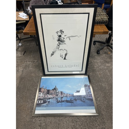 428B - Two framed posters largest measures approximately: 42 inches tall x 32 wide