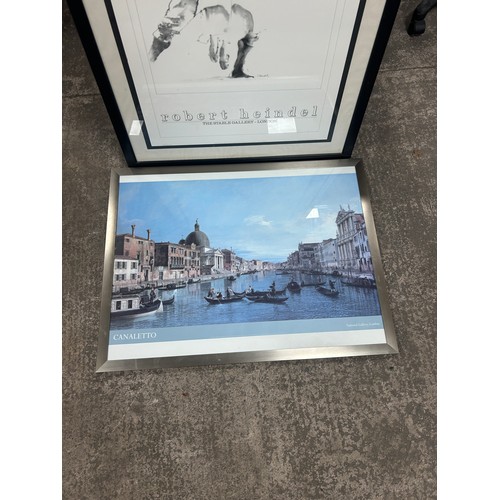 428B - Two framed posters largest measures approximately: 42 inches tall x 32 wide