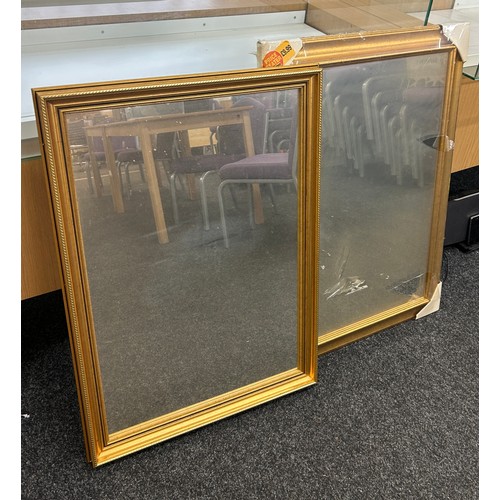 187 - Two gold framed wall hanging mirrors largest measures approximately: 25 x 35 inches