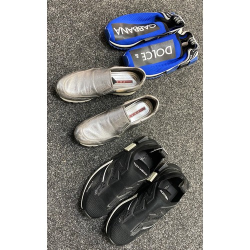 199 - Two pairs of Dolce and Gabbana trainers and a pair of Prada shoes.