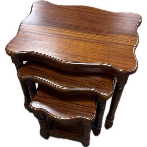 393 - Mahogany nest of three tables maker Ancient Marinea largest measures approximately: 22 inches tall x... 