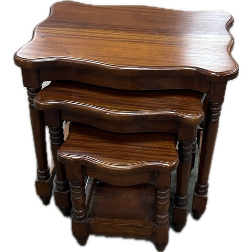 393 - Mahogany nest of three tables maker Ancient Marinea largest measures approximately: 22 inches tall x... 