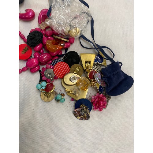 490 - Large selection of assorted costume jewellery includes beads, earrings etc
