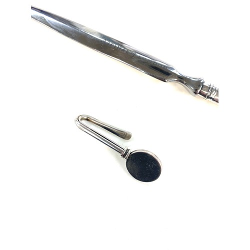 454 - Silver handled Aspinal of London letter opener and a silver tie clip
