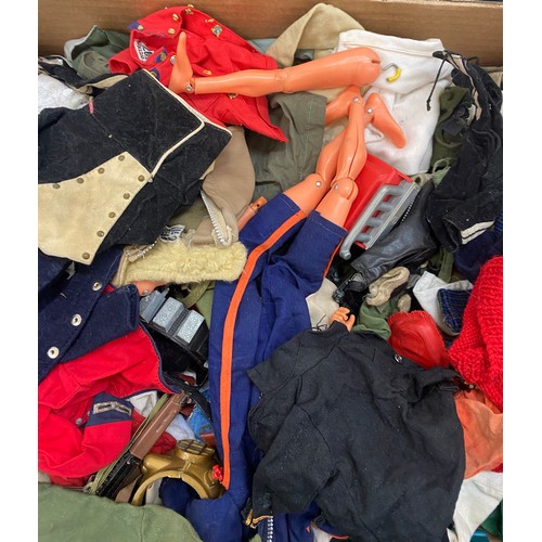 303 - Large lot of vintage action man clothes and accessories to include boots, weapons etc