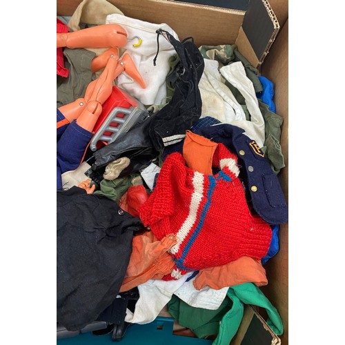 303 - Large lot of vintage action man clothes and accessories to include boots, weapons etc