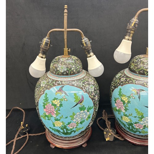 217 - Pair vintage Chinese porcelain vase table lamps on wooden stands , in famille rose style, both have ... 