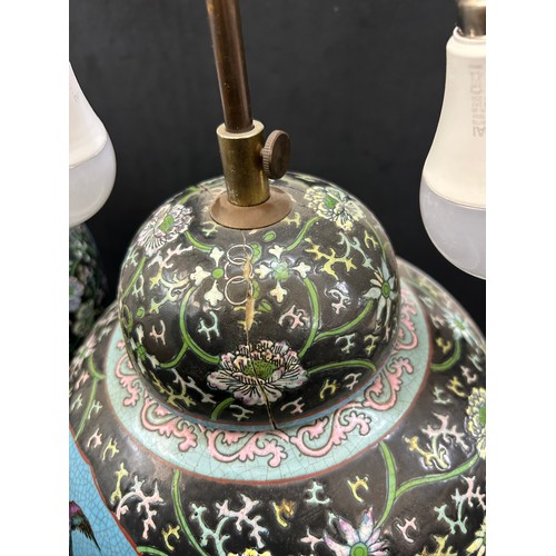 217 - Pair vintage Chinese porcelain vase table lamps on wooden stands , in famille rose style, both have ... 