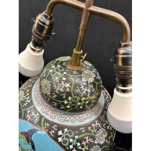 217 - Pair vintage Chinese porcelain vase table lamps on wooden stands , in famille rose style, both have ... 