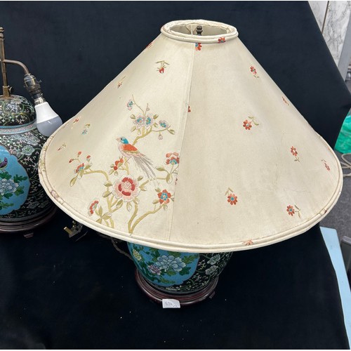 217 - Pair vintage Chinese porcelain vase table lamps on wooden stands , in famille rose style, both have ... 
