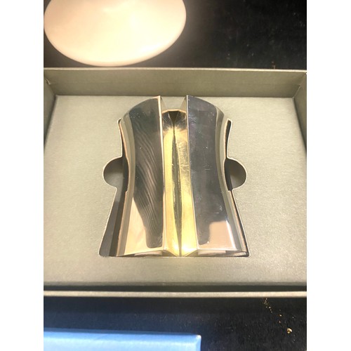 180 - Three pieces of Wedgwood includes salt and pepper, vases etc