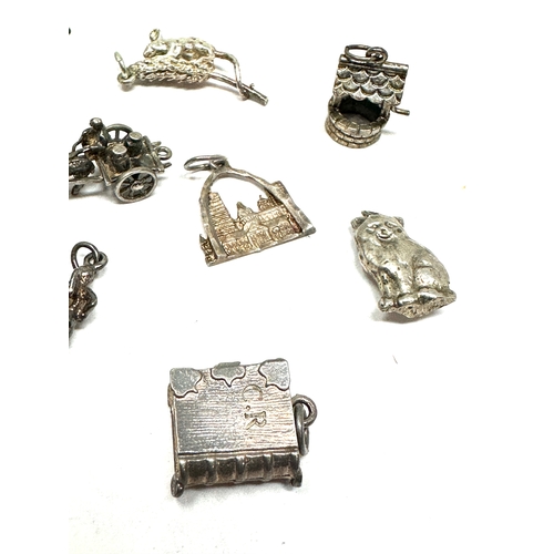 54 - 10 vintage silver charms weight 27g