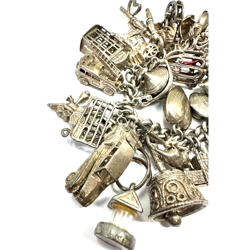 59 - Large heavy silver charm bracelet & charms weight 138g
