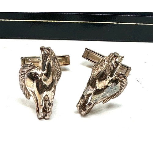 232 - Boxed set of silver horse cufflinks silver