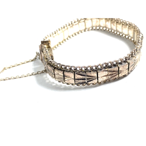 180 - Vintage Silver link bracelet featuring a textured, geometric design and a safety chain Weight 37g