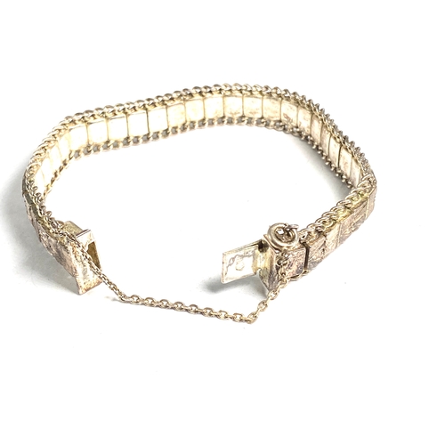 180 - Vintage Silver link bracelet featuring a textured, geometric design and a safety chain Weight 37g