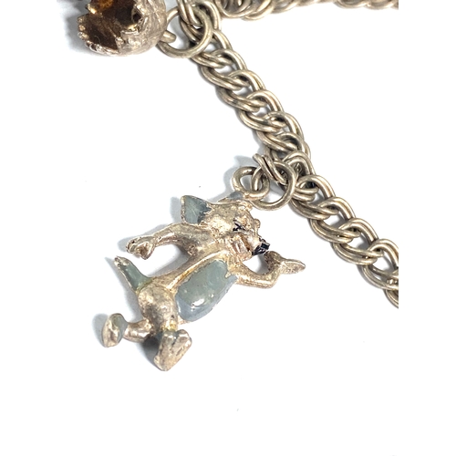 181 - Vintage Silver Charm Bracelet with 4 Charms inc Tom from Tom and Jerry MGM 1973 Weight 20g