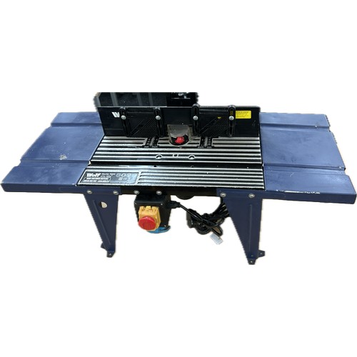 Wolf router table and a wolf router in working order