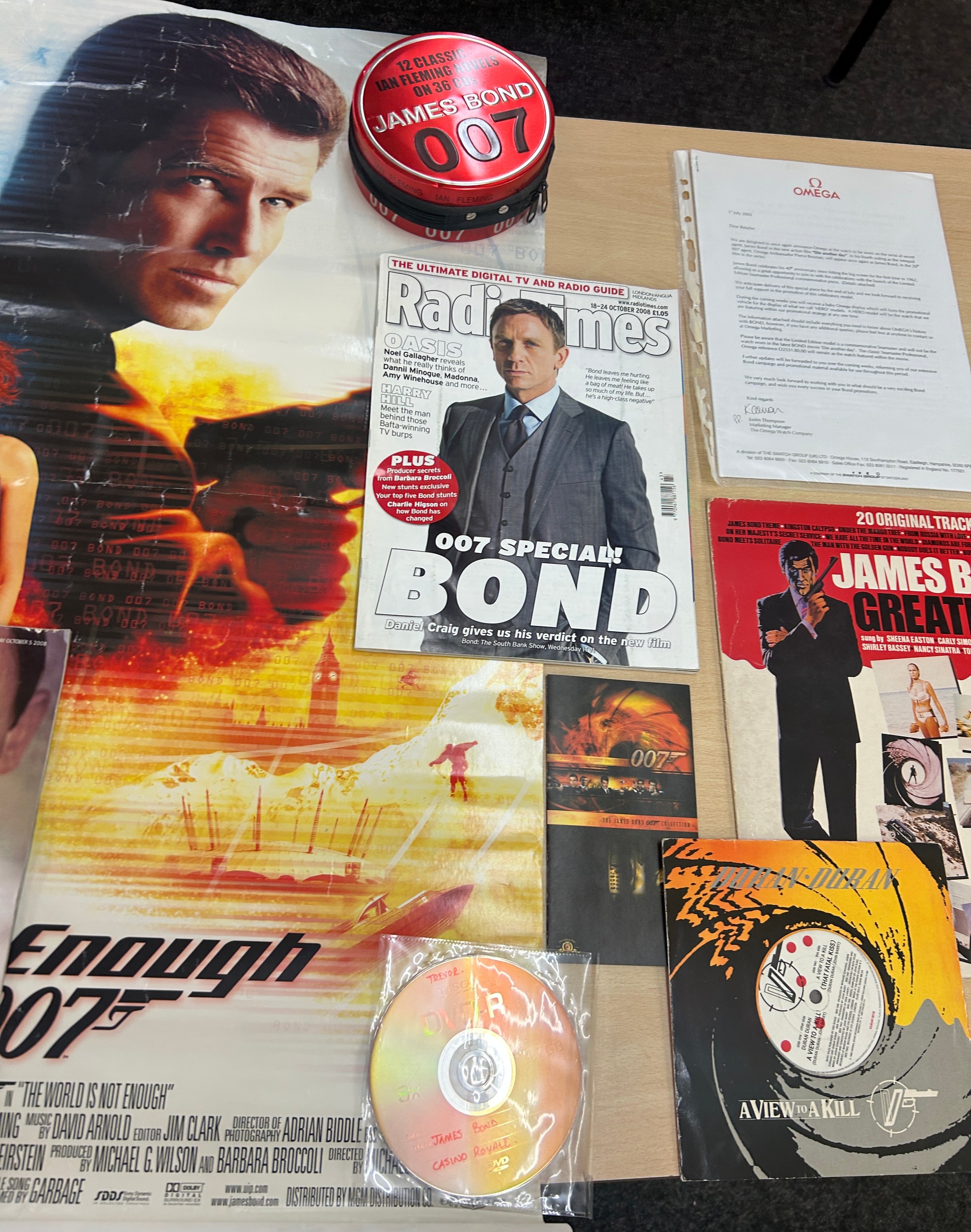 Collection of vintage James Bond 007 memorabilia, primarily focusing on ...