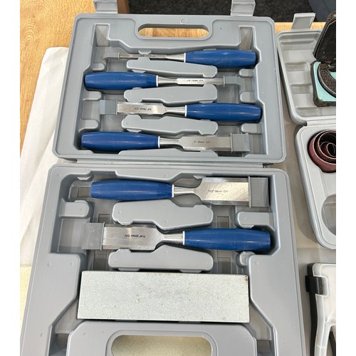 Selection of boxed tools to include chisels, sanding kit, precision ...