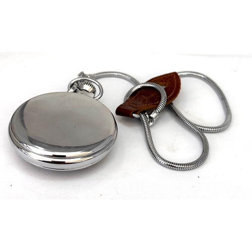 508 - vintage Smiths pocket watch featuring a black dial with white Arabic numerals and a silver-toned met... 