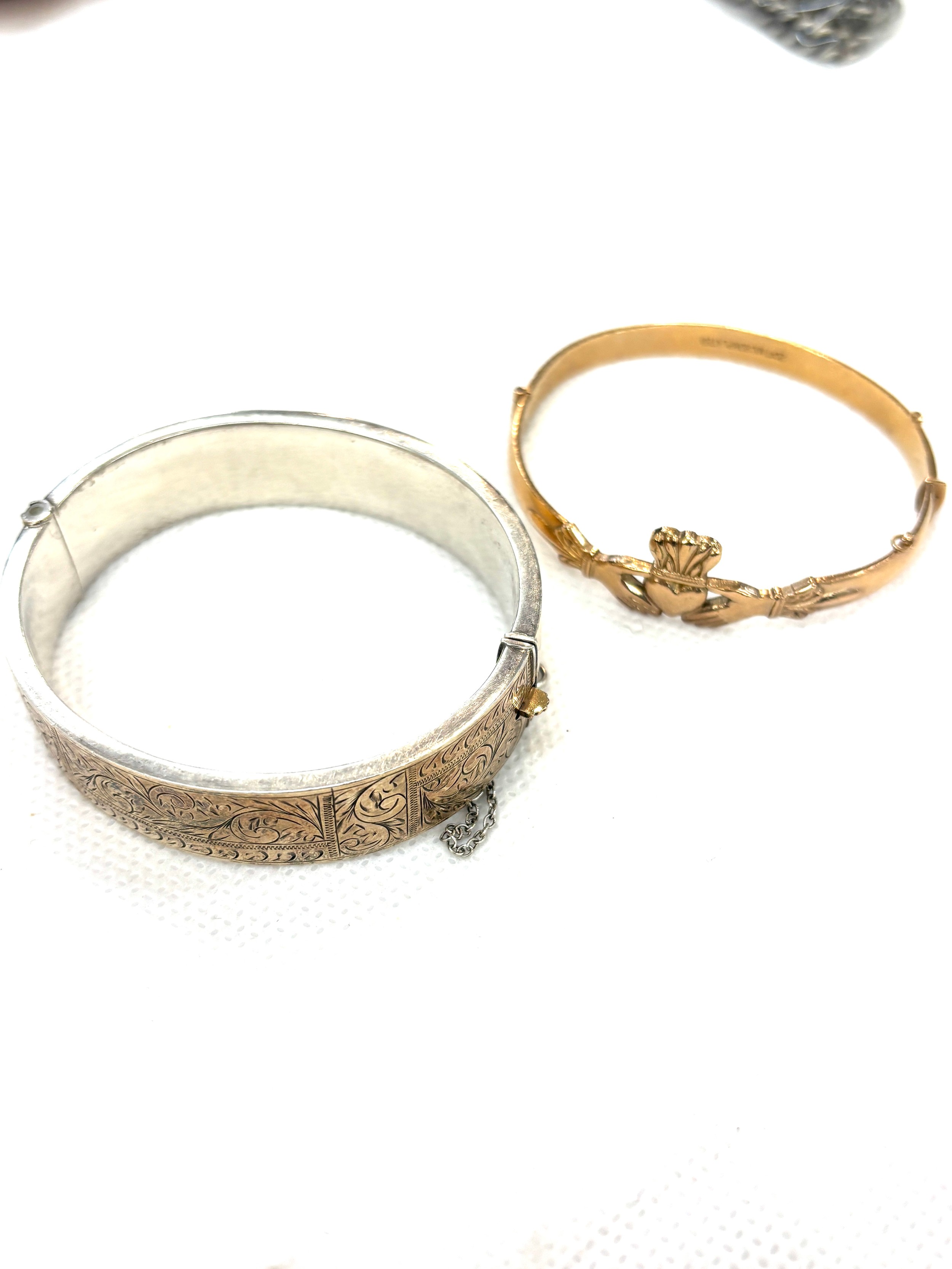 Vintage 9ct gold front bangle and a claddagh bangle, 20ct gold plated ...