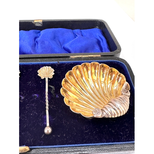 4 - Antique silver shell salt set featuring two scallop shell dishes and two matching spoons, presented ... 
