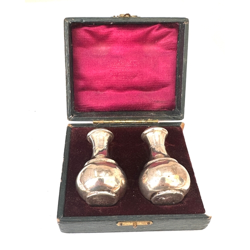 39 - Boxed pair of silver pepper pots London silver hallmarks