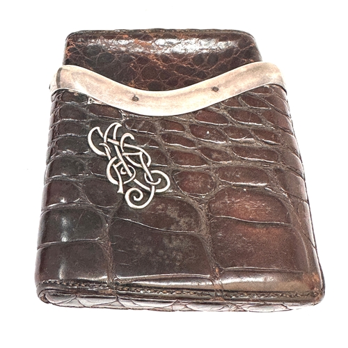 40 - Victorian crocodile skin cigar case featuring a sterling silver band hallmarked for London by benson