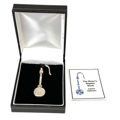 46 - Boxed silver napkin holder