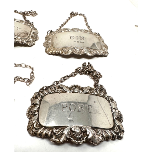 58 - 4 Vintage silver hallmarked wine labels