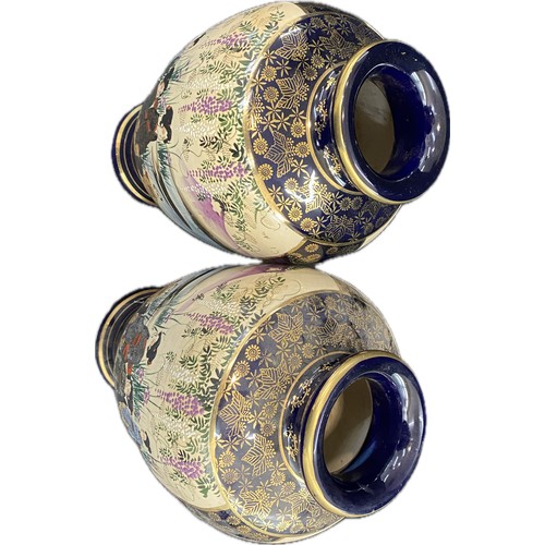 37 - A pair of Japanese satsuma style ceramic vases measuring 12