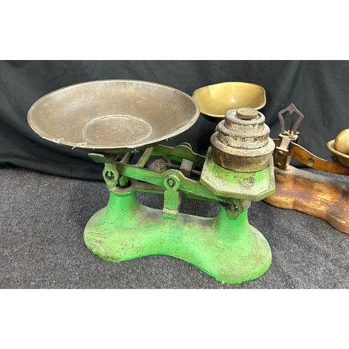 28 - Two vintage cast iron balance scales with assorted weights