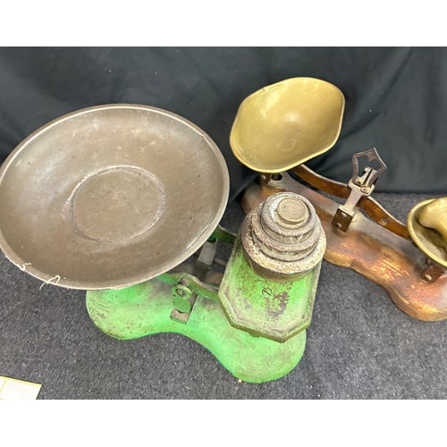 28 - Two vintage cast iron balance scales with assorted weights