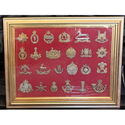 29 - Framed selection of vintage cap badges - 24 in total, frame measures 13 x 15.5 inches