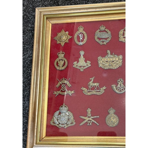 29 - Framed selection of vintage cap badges - 24 in total, frame measures 13 x 15.5 inches